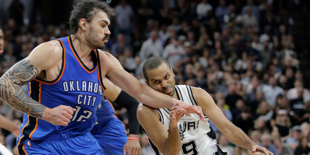 Steven Adams defends Tony Parker during the Thunder's game-five win over the Spurs