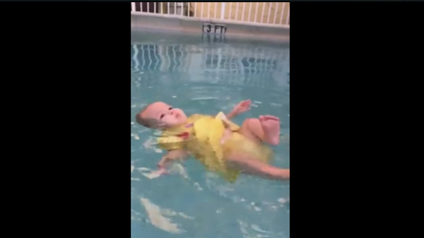 Still from video showing baby in the water- WFLA