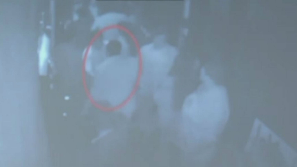 Surveillance footage of the fight with Marcus Owens circled in red