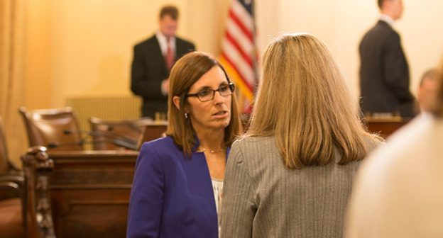 Rep. Martha McSally R-Tucson and Tucson International Airport President Bonnie Allin speak after a hearing on problems with Transportation Security Administration performance at airport security checkpoints