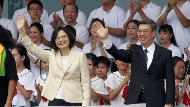 Taiwan's new President Tsai Ing-wen and vice president Chen Chien-jen wave during their inauguration ceremonies in Taipei on Friday