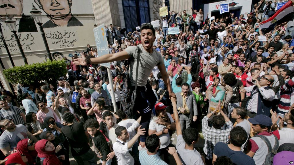 FILE- Egyptians shout slogans against Egyptian President Abdel Fattah el-Sissi during a protest against the decision to hand over control of two strategic Red Sea islands to Saudi Arabia in Cairo Egypt