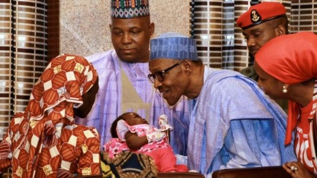 The first rescued Chibok girl showed her child to President Buhari