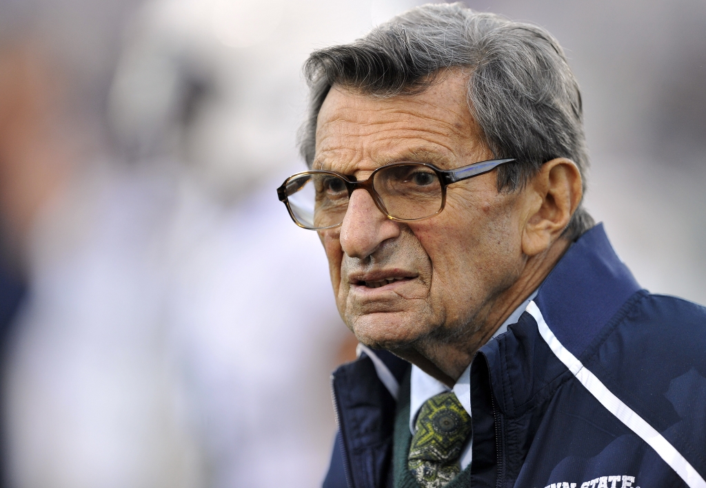 Penn State coach Joe Paterno stands on the field before his team's NCAA college football game against Northwestern in Evanston Ill. Paterno's doctors say that the former Penn State coach