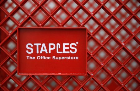 A shopping cart is seen outside a Staples office supplies store in the Chicago suburb of Glenview Illinois