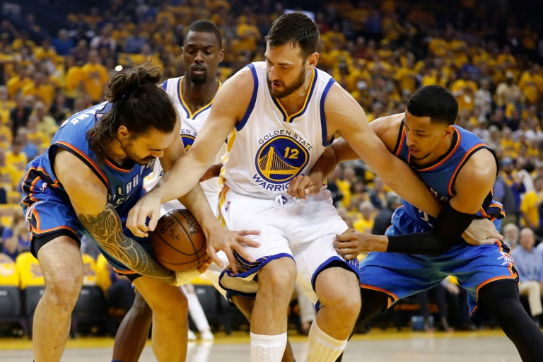 Getty  AFP  Christian Petersen Andrew Bogut of the Golden State Warriors fights for possesion of the ball with Steven Adams of the Oklahoma City Thunder