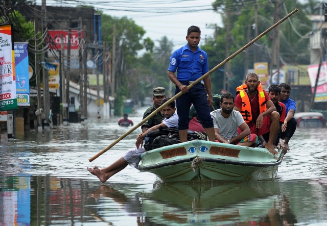 Foreign aid reaches flooded Sri Lankan capital 71 dead