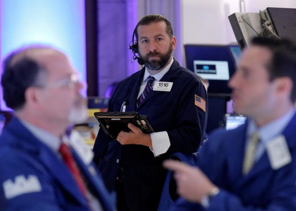 Wall Street opens flat as oil prices surrender gains