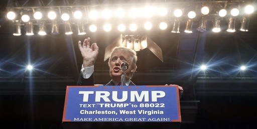 Republican presidential candidate Donald Trump gestures during a rally in Charleston