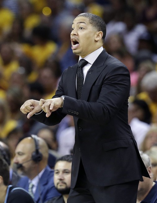 Cleveland Cavaliers coach Tyronn Lue gestures during the first half of Game 2 of the NBA basketball Eastern Conference finals between the Cavaliers and the Toronto Raptors Thursday