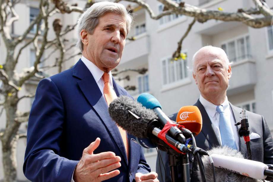 U.S. Secretary of State John Kerry left standing next to the UN Special Envoy for Syria Staffan de Mistura right speaks to the media during a press briefing after their meeting on Syria in Geneva Switzerland Monday