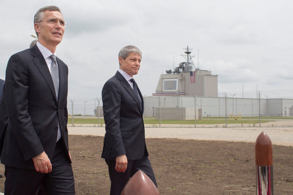 NATO Secretary General Jens Stoltenberg and Romanian Prime Minister Dacian Ciolos arrive for an official inauguration ceremony at Deveselu air base Romania