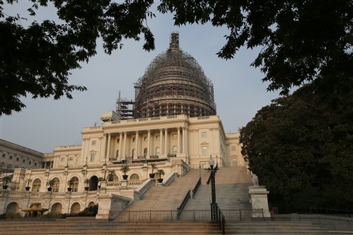 The west front of the U.S. Capitol is seen under repair Sept. 2 2015 in Washington. Congress returns on Sept. 8 with a critical need for a characteristic that has been rare through a contentious spring and summer _ cooperation between Republicans and Pre