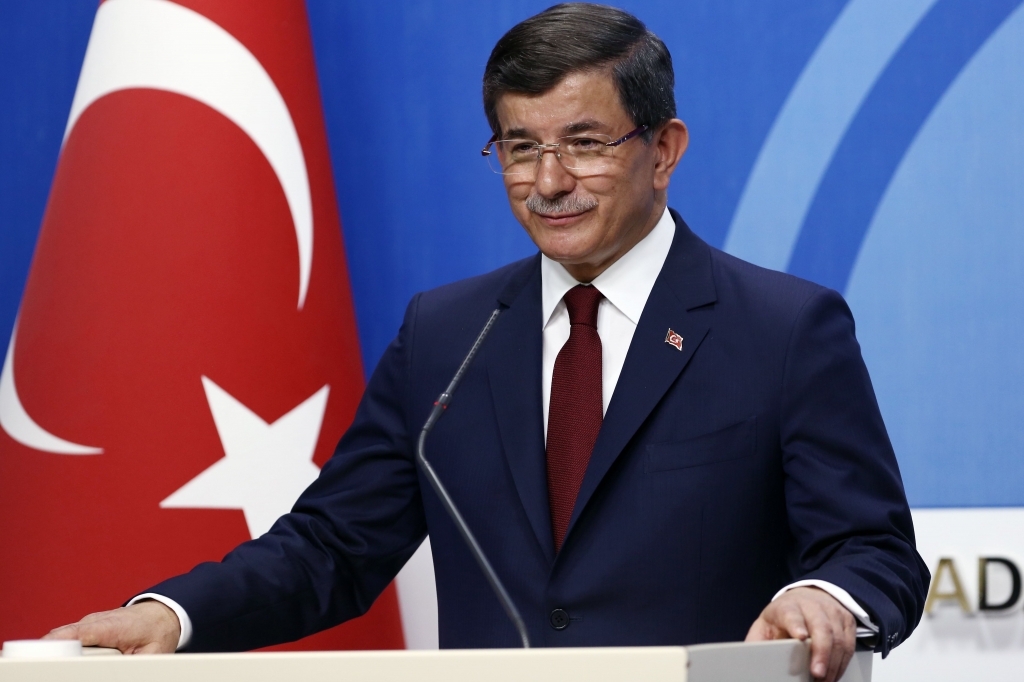 Turkey Politics Turkish Prime Minister Ahmet Davutoglu looks toward his friends at the end of his press conference at the headquarters of his ruling Justice and Development Party AKP in Ankara Turkey on Thursday