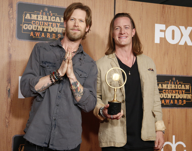 CORRECTS WINNING CATEGORY TO GROUP  DUO- Tyler Hubbard left and Brian Kelley of Florida Georgia Line pose award for group  duo in the press room at the 2016