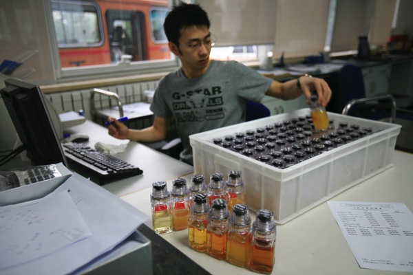 Urine samples from Chinese athletes are recorded upon arriving at the China Anti Doping Agency in Beijing