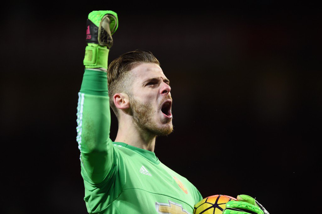 MANCHESTER ENGLAND- MARCH 02 David De Gea of Manchester United celebrates the opening goal scored by Juan Mata during the Barclays Premier League match between Manchester United and Watford at Old Trafford