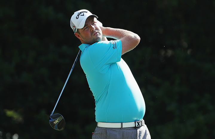 Marc Leishman hits his tee shot on the 11th hole during the first round of The Players Championship at the TPC Stadium course