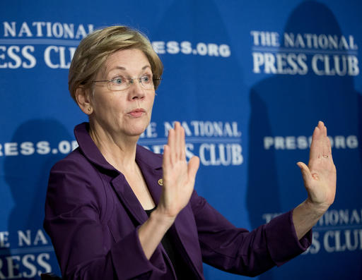 Sen. Elizabeth Warren D-Mass. gestures before speaking at the National Press Club in Washington. Warren has taken to Twitter to attack what she calls presumptive Republican presidential nominee Donald Trumps