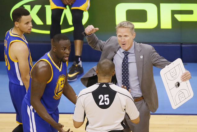 Golden State Warriors head coach Steve Kerr right and forward Draymond Green dispute a flagrant foul call on Green in the first half in Game 3 against