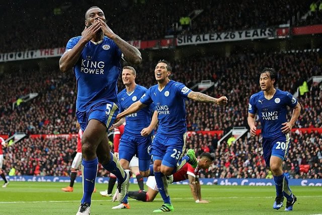 Wes Morgan runs away in celebration after scoring for Leicester at Old Trafford as the captain showed his team-mates how it’s done. — DailyMail