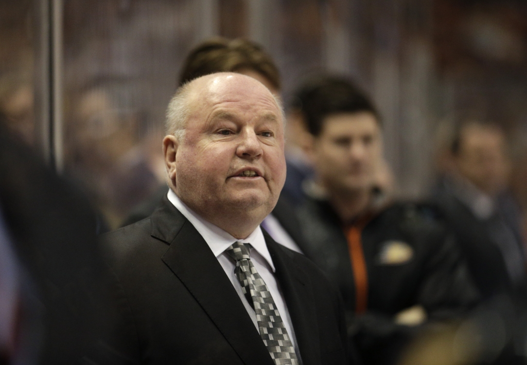 Anaheim Ducks head coach Bruce Boudreau coaches his team during the first period of an NHL hockey game against the Dallas Stars in Anaheim Calif. Bruce Boudreau has agreed to terms to coach the Minnesot