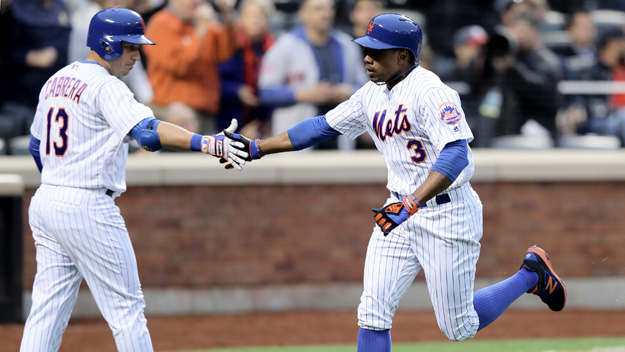 The Mets&#039 Curtis celebrates his solo home run with teammate Asdrubal Cabrera against the Washington Nationals