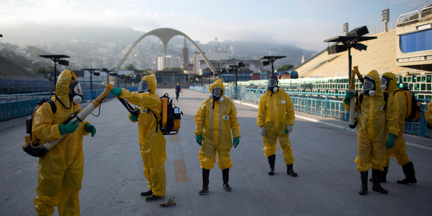 Health workers in January sprayed insecticide to combat the Aedes aegypti mosquitoes that transmits the Zika virus at the Sambadrome in Rio de Janeiro