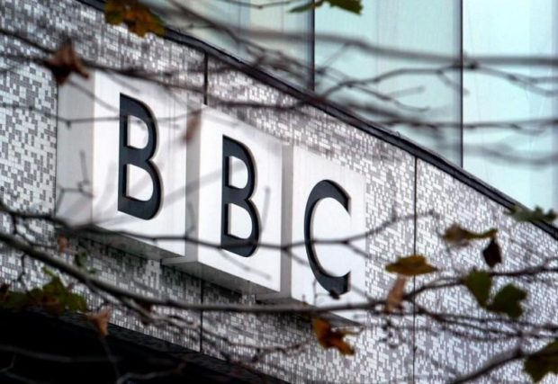 A BBC logo is seen at the company's offices in west London