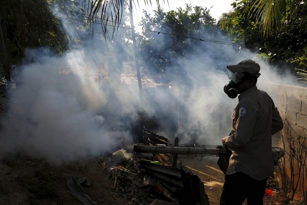 Image Health worker fumigates a neighborhood as part of the preventive measures against the Zika virus and other mosquito-borne diseases in Veracruz on the outskirts of Panama City