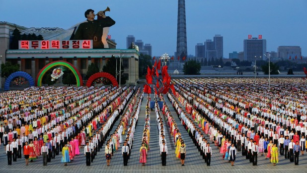 People participate in a mass dance in the capital's main ceremonial square a day after the ruling Workers Party