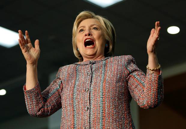 Democratic presidential candidate Hillary Clinton reacts on stage at a United Food and Commercial Workers International Union hall Wednesday