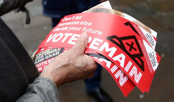 A campaigner hands out a'Vote Remain leaflet near Angel London Underground Station in London