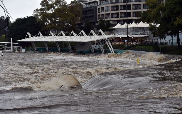 A ferry terminal is submerged by the overflowing Parramatta river in Sydney on Sunday 5 June 2016