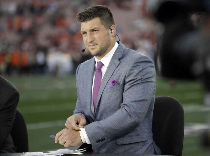 David J. Phillip Associated Press Tim Tebow helped a passenger on a flight Sunday with the incident going viral online Monday. AP