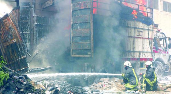 Firemen attempting to put out fires caused by the Russian aircampagn in Idlib Getty images