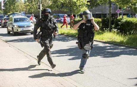 VIERNHEIM GERMANY- JUNE 23 Heavily-armed police outside a movie theatre complex where an armed man has reportedly opened fire