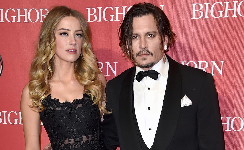 Johnny Depp ‘tried to suffocate Amber Heard