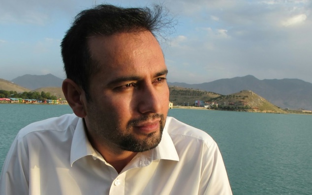 Afghan reporter Zabihullah Tamanna as he poses for