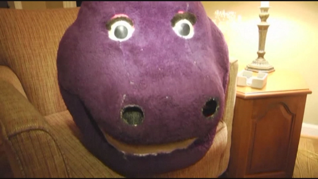 An Alabama teen started out trying to punk her friends but instead became stuck inside a giant Barney dinosaur head