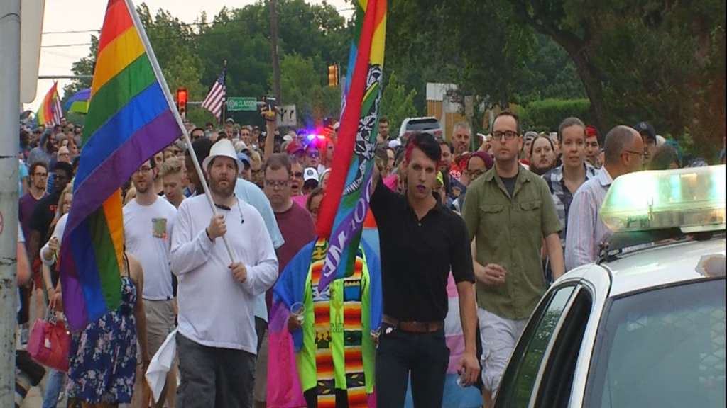 An estimated 500 or more people met near Classen and 39th St. at sunset Sunday for a candlelight vigil