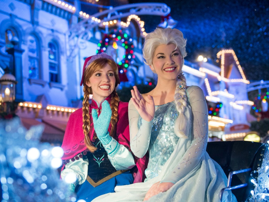 Actresses dressed as Frozen characters Anna and Elsa at Magic Kingdom in Lake Buena Vista Fla