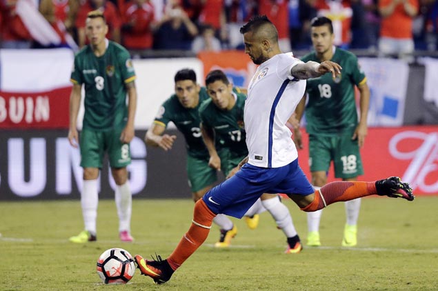 Penalty helps titleholder Chile down Bolivia and keep hopes alive in Copa America