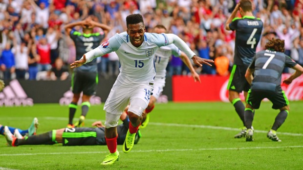 At the death Daniel Sturridge wheels away in celebration after his late goal against Wales