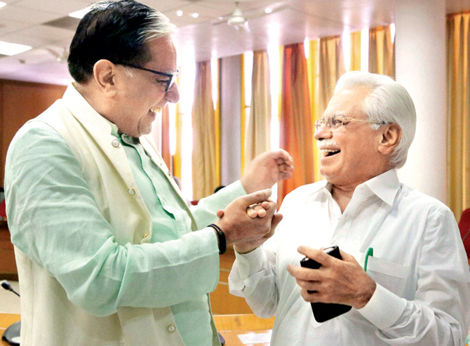 BJP supported RS candidate Subhash Chandra and INLD-Congress nominee RK Anand during polling in Chandigarh on Saturday