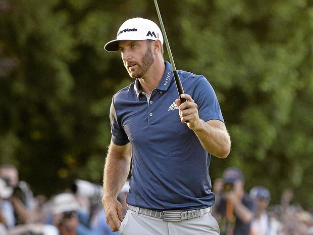 BREAKTHROUGH WIN Dustin Johnson celebrates after making a birdie on the final hole to seal victory in the US Open at Oakmont