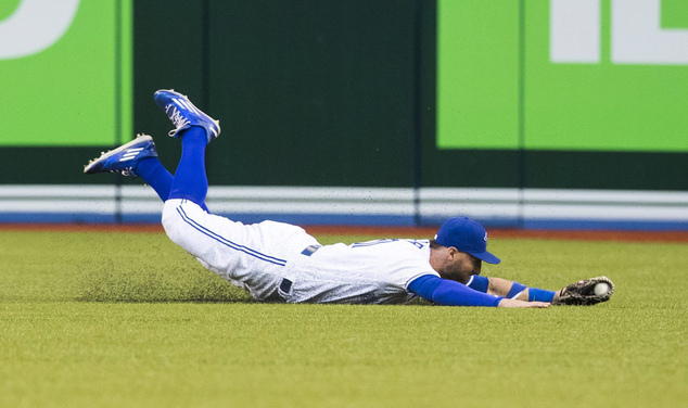 Toronto Blue Jays Kevin Pillar makes a diving catch against the New York Yankees during the fourth inning of a baseball game Tuesday