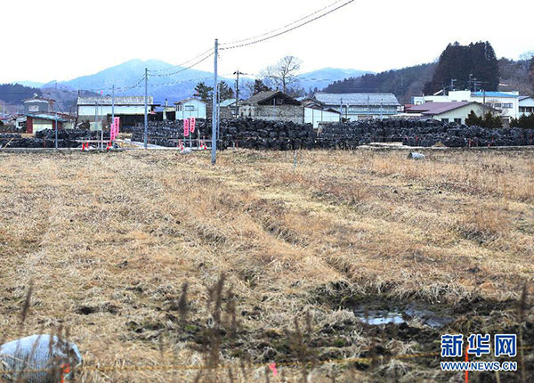 Black bags containing buildup of contaminated wastes are seen in the town of Iitate Fukushima Prefecture Japan