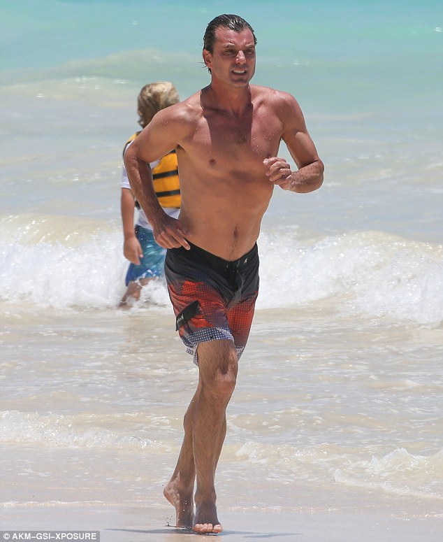 Hot physique Gavin Rossdale 50 took his two oldest boys Kingston and Zuma on a kayak trip in Hawaii on Thursday. Before leading the kayak expedition he decided to warm up a little