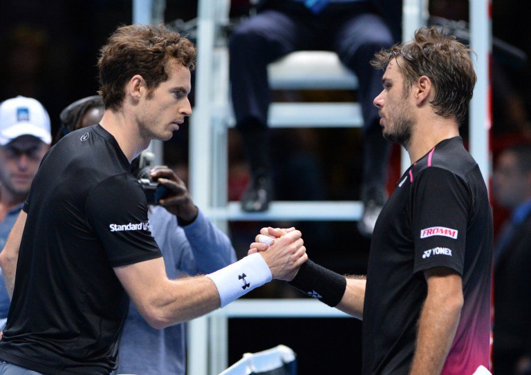 Britain's Andy Murray shakes hands with Switzerland's Stan Wawrinka. AFP